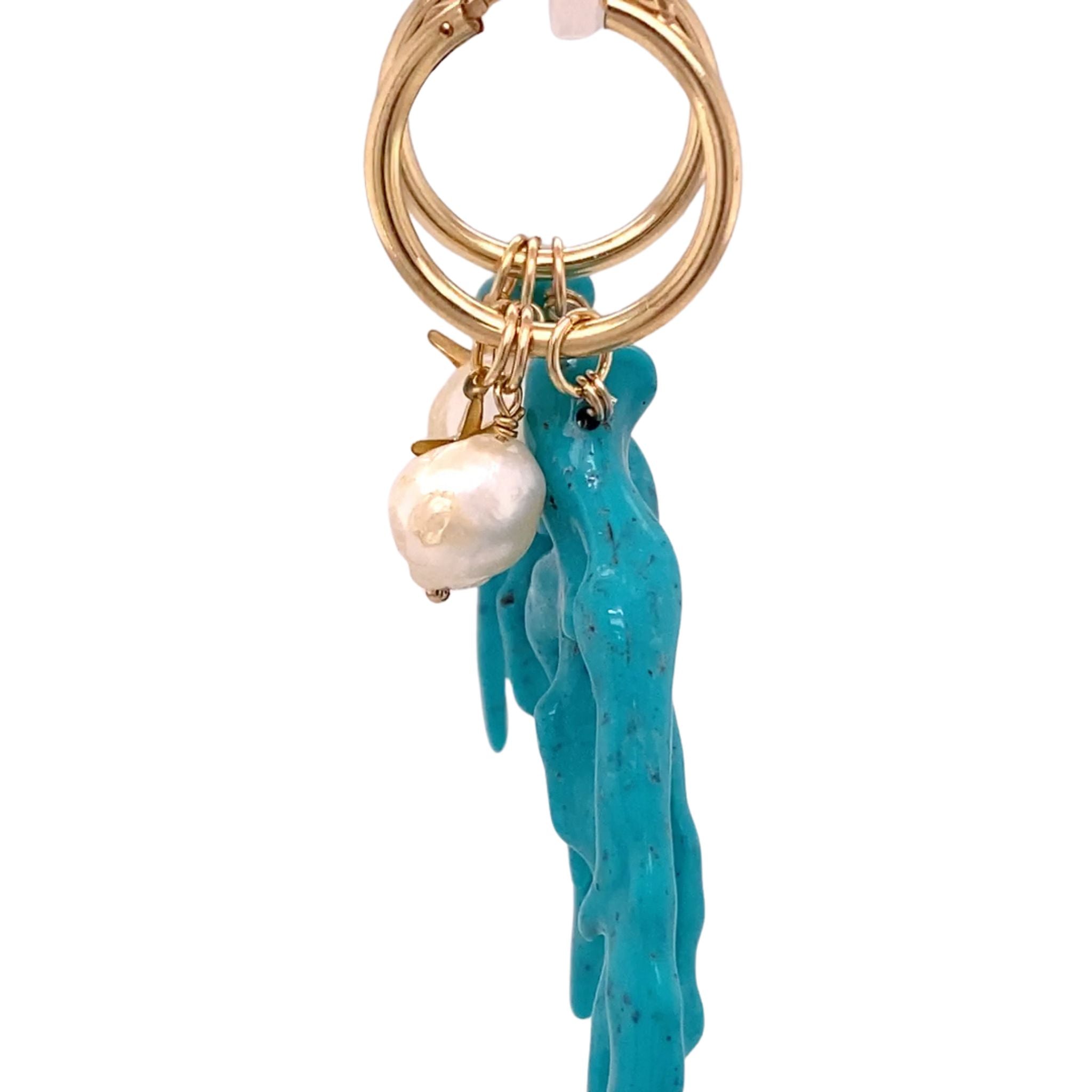 Statement Oorbellen met turquoise koraal hanger