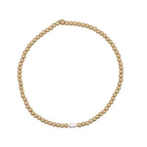 Gouden balletjes armband met single pearl