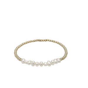 Gouden bolletjes armband met een Touch of Pearls